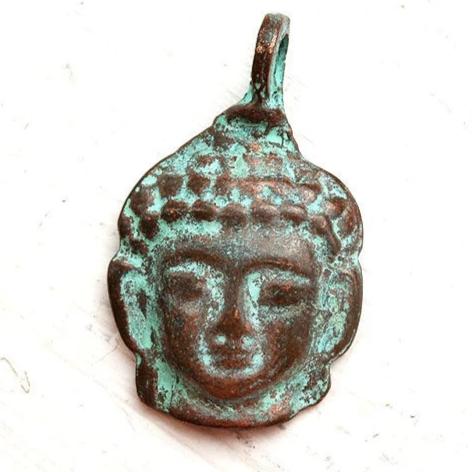Buddha face Green patina on copper pendant