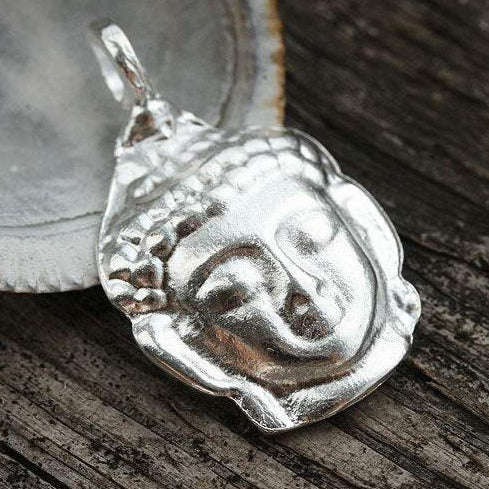Silver Buddha face pendant bead