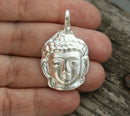 Silver Buddha face pendant bead