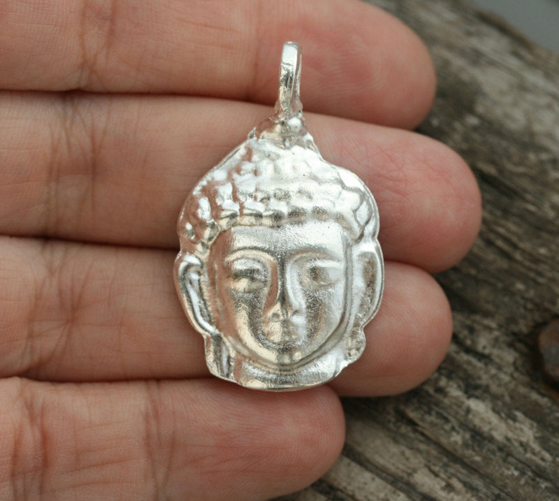 Silver Buddha face pendant bead
