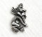 Antique silver dragon pendant