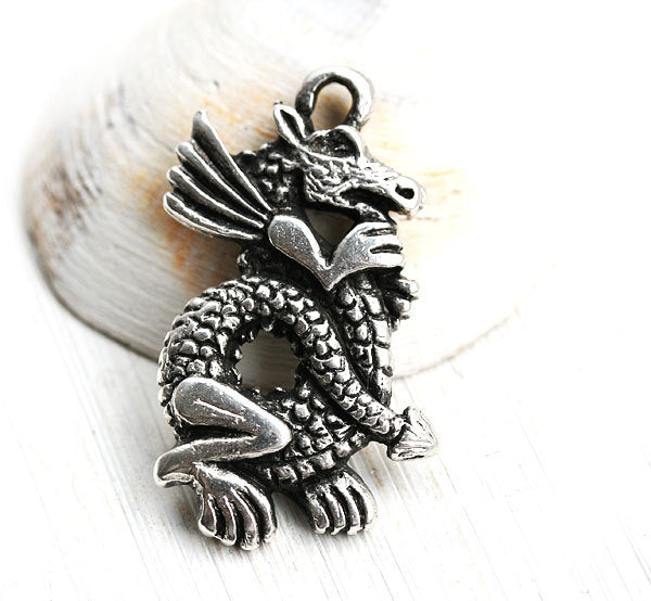 Antique silver dragon pendant
