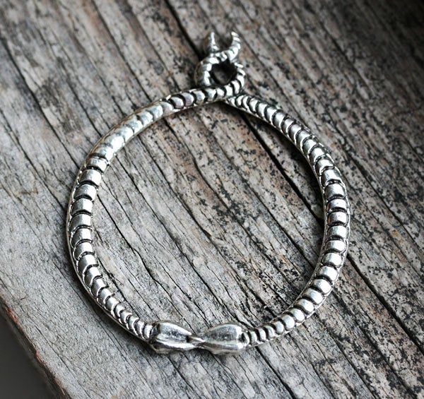 Antique silver Circle of snakes pendant