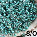 8/0 Toho seed beads, Inside Color Rainbow Crystal Teal Lined N 264 - 10g
